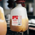 Jug of Blake's apple cider being filled